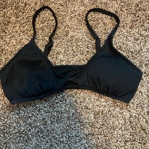 Rigged, slitted, bathing suit top. Worn maybe 1-2 times.